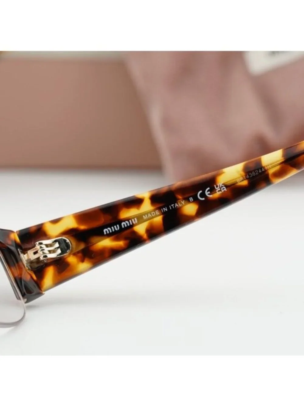 Miu Miu MUB07S 14L08N Rectangle Sunglasses – Havana/Blue-Violet Light Filter